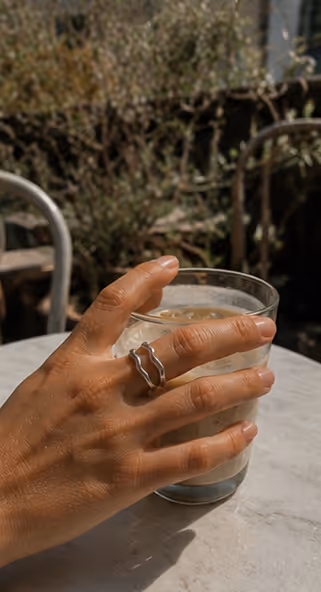 Handmade silver ring on hand