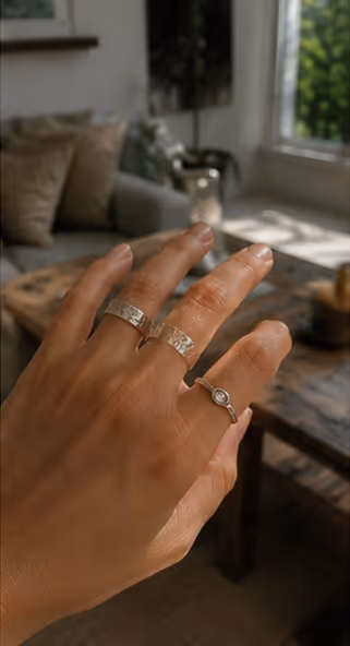 Handmade silver ring on hand