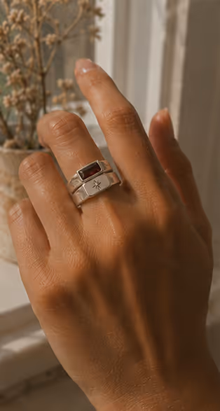 Handmade silver ring on hand