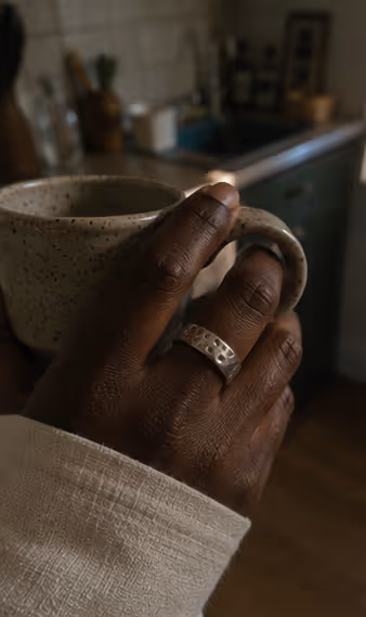 Handmade silver ring on hand